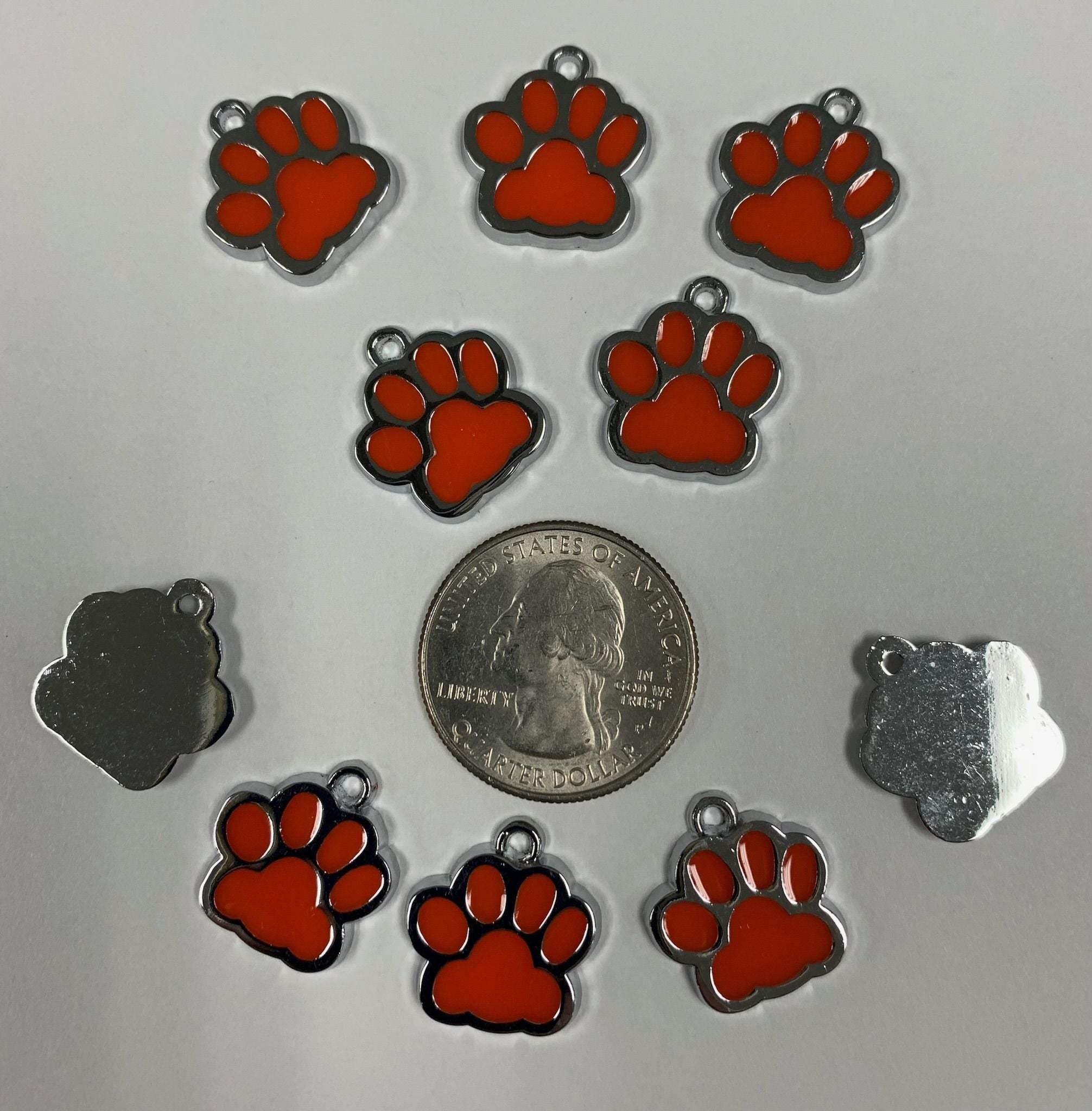 Silver Plate and Orange Enamel Paw Charms