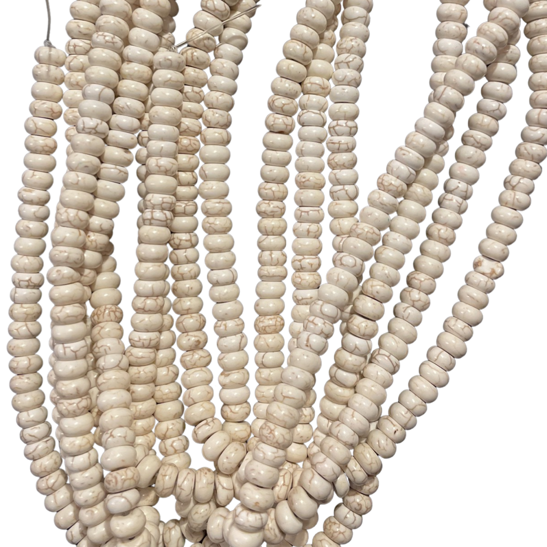Ivory Magnesite 5x8mm Round Beads