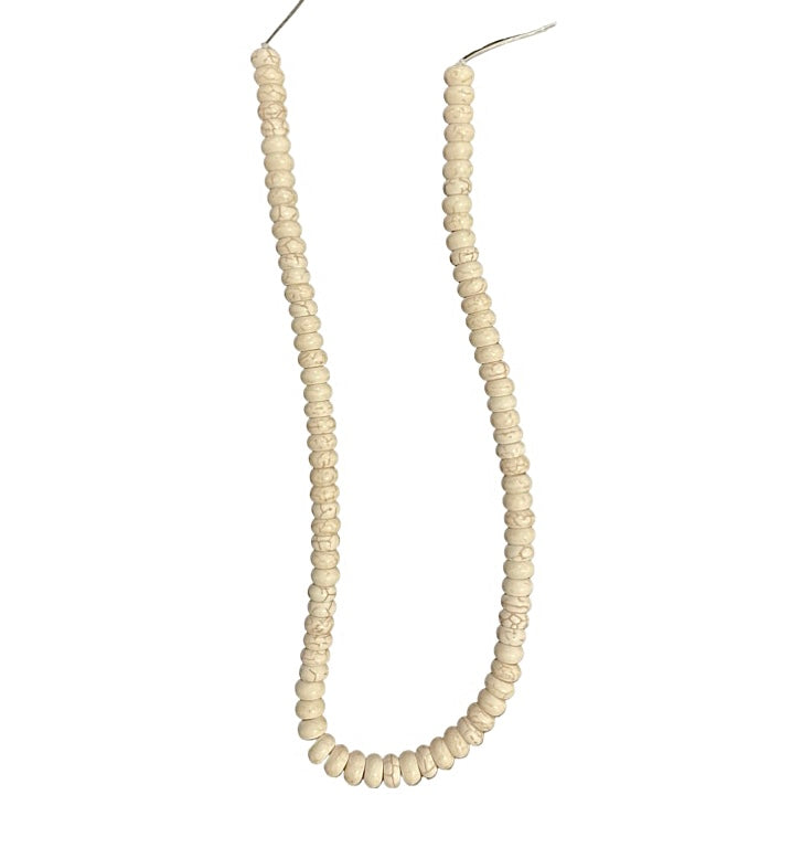 Ivory Magnesite 5x8mm Round Beads