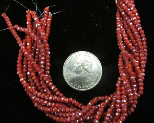 Rusty red 1.5 x 2.5mm faceted Chinese Crystal glass Rondelle beads. 8 inch strand.